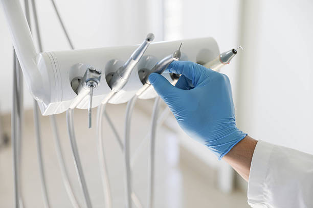 Professional Tooth Extraction technician working in Rantoul, IL